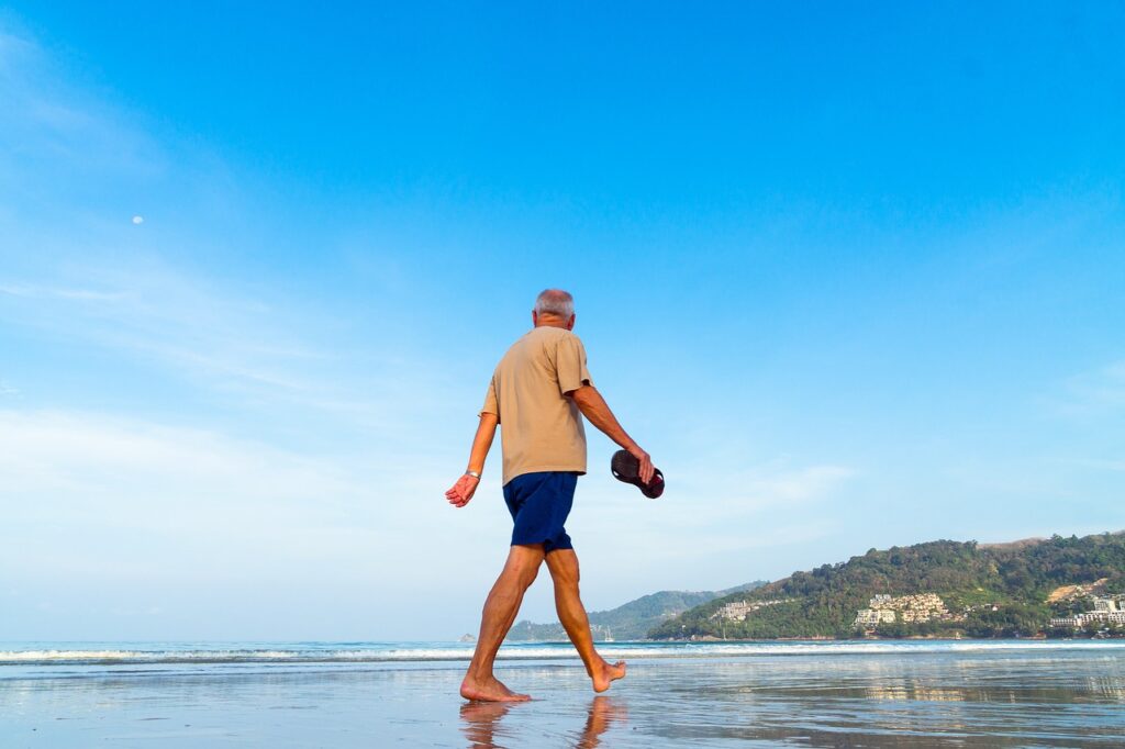 beach, senior, man, male, walking, retired, sea, shore, mature, ocean, active, seaside, sand, leisure, vacation, lifestyle, activity, coast, shoes, barefoot, exercise, morning, sky, blue, mountain, outdoor, nature, water, legs, senior citizen, enjoying, sun, summer, stroll, night sky, travel, holiday, person, pension, moon, dream, life, live, blue exercise, blue sun, blue moon, blue mountain, blue life, blue summer, blue walking, blue dream, blue shoes, blue sand, blue sky, blue morning