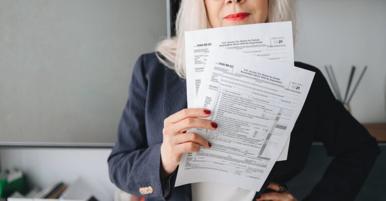 Businesswoman presenting tax documents in a modern office setting.